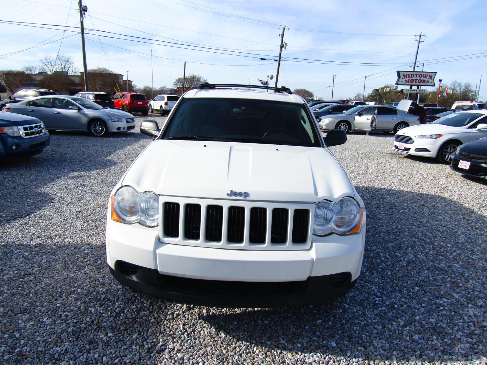 2009 WHITE Jeep Grand Cherokee (1J8GS48KX9C) , Automatic transmission, located at 15016 S Hwy 231, Midland City, AL, 36350, (334) 983-3001, 31.306210, -85.495277 - Photo #1